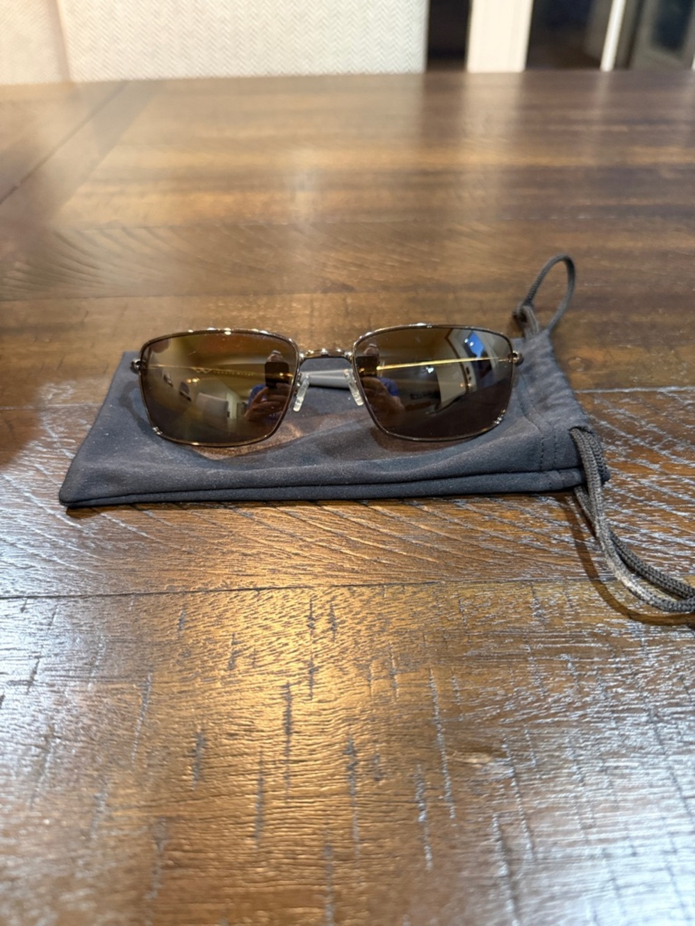 Oakley Silver Frame Brown Lens Sunglasses